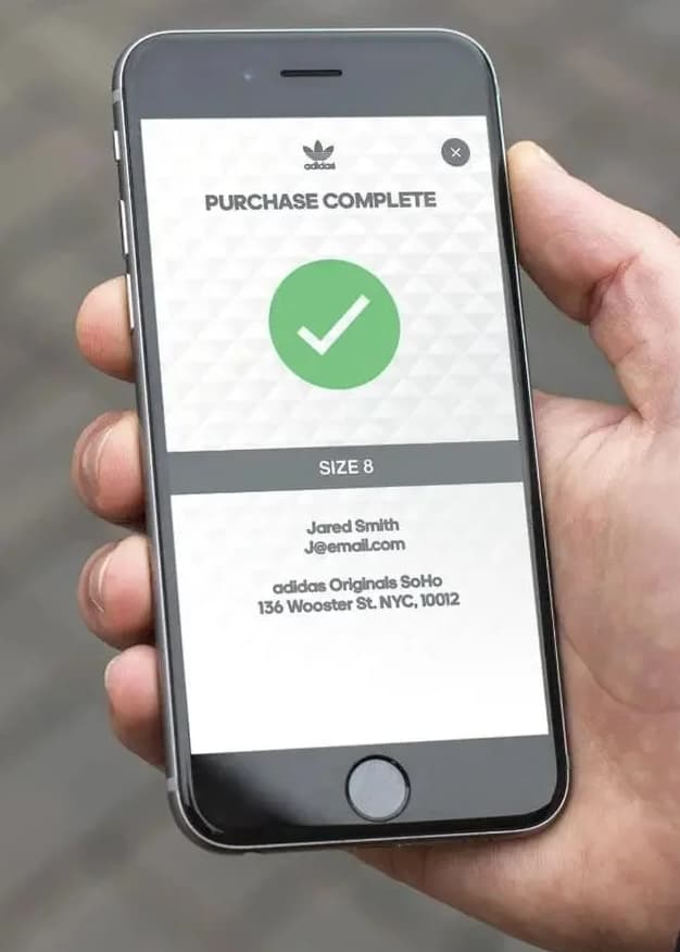 Confirmed app — purchase complete screen showing adidas Originals SoHo pick-up location